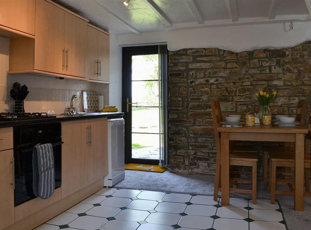 Kitchen and dining area (photo 2) at Willow Cottage in Woolfardisworthy, near Bideford, Devon