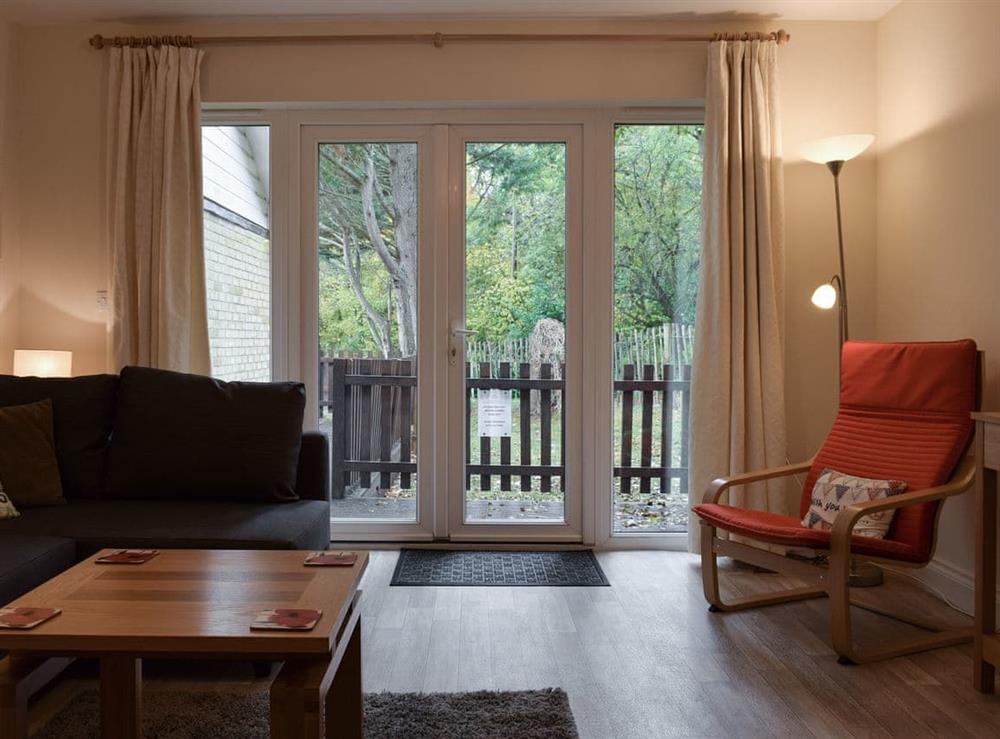 Living room with patio doors at Willow Cottage  in Wootton Bridge, Isle of Wight
