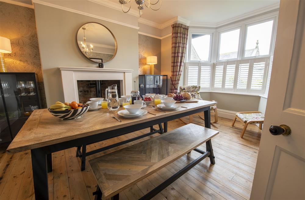 Dining room featuring multi-fuel stove at Willow Garth, Leyburn