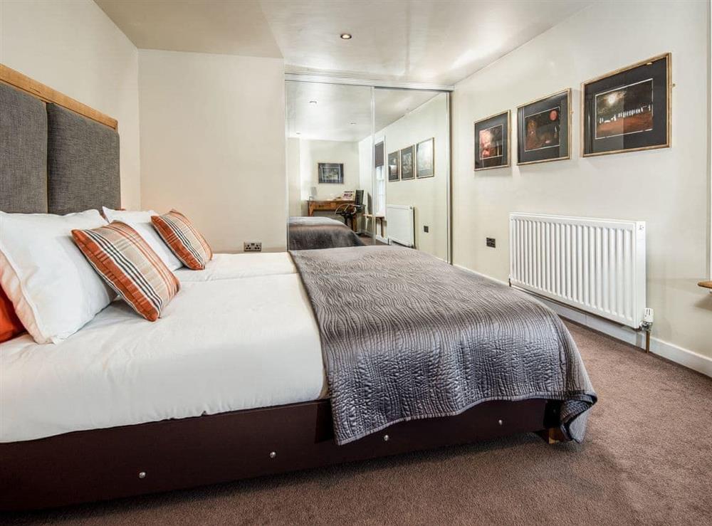 Peaceful double bedroom with built-in storage at Willow in Gatehouse of Fleet, Kirkcudbrightshire