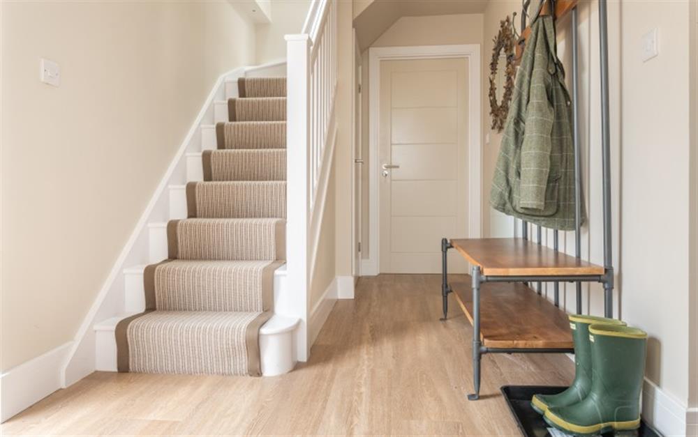 Large entrance hall with space for coats and boots at Willow Lodge in Glastonbury, Pilton