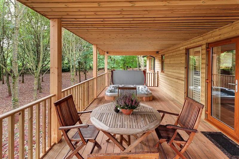 Decked area, with your outdoor hot tub at Willow Lodge - South View Lodges, Exeter, Devon