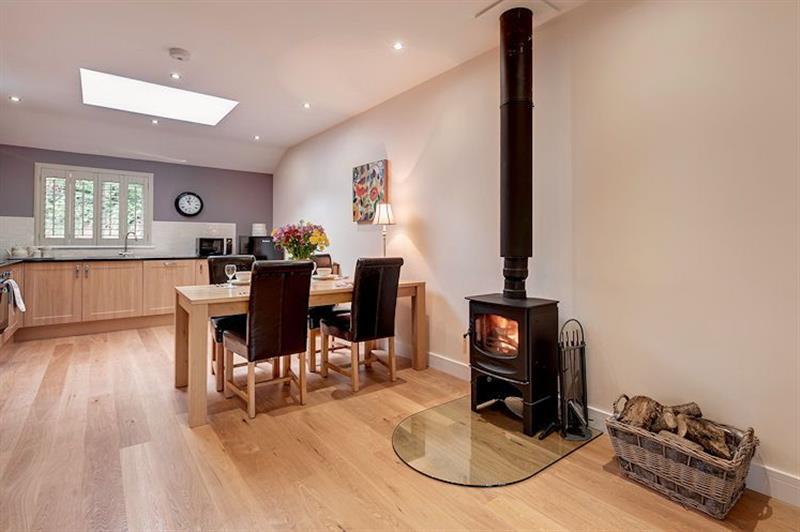 Living room with a wood burner at Willow Lodge - South View Lodges, Exeter, Devon