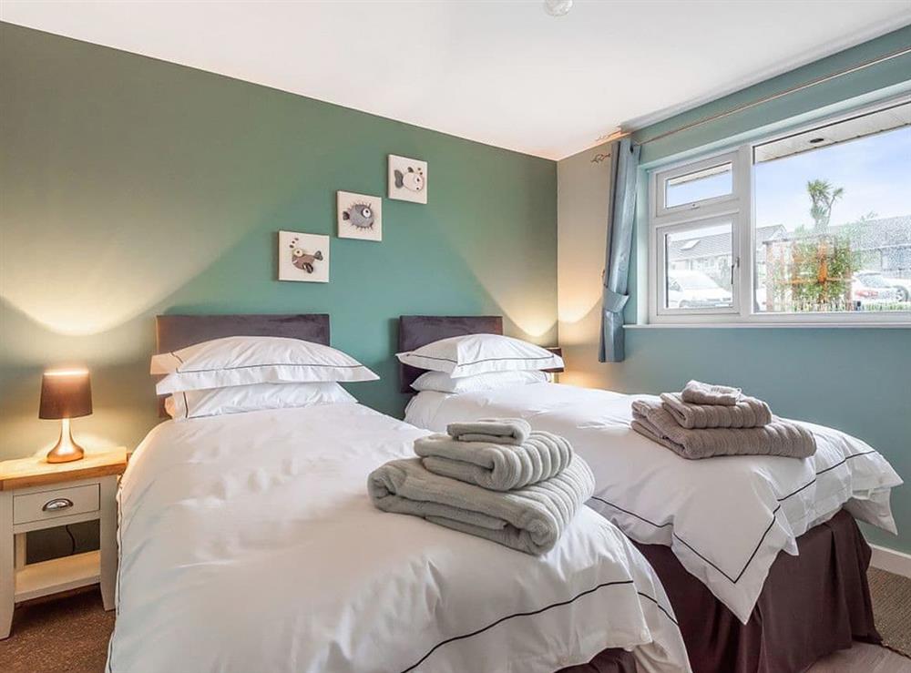 2nd bedroom set up as a twin room at Willow in St Mawes, Cornwall