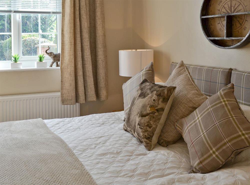 Comfortable master bedroom at Willow Tree Cottage in Foxholes, near Driffield, North Yorkshire
