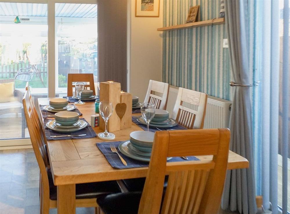 Charming dining area at Willow Tree Lodge in Whitwell, near Ventnor, Isle of Wight