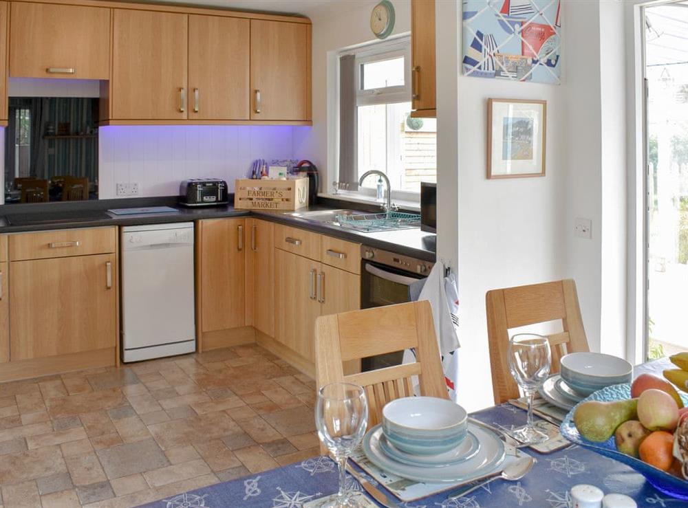Well equipped kitchen/ dining area at Willow Tree Lodge in Whitwell, near Ventnor, Isle of Wight