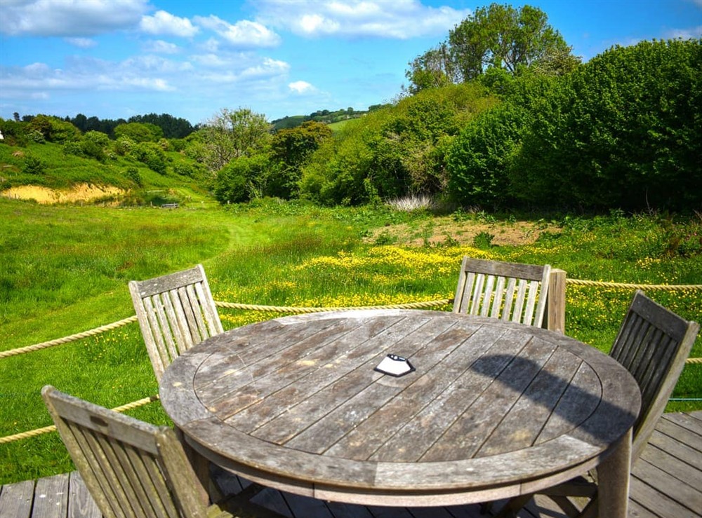 Sitting-out-area at Willow Yurt in Beaminster, Dorset