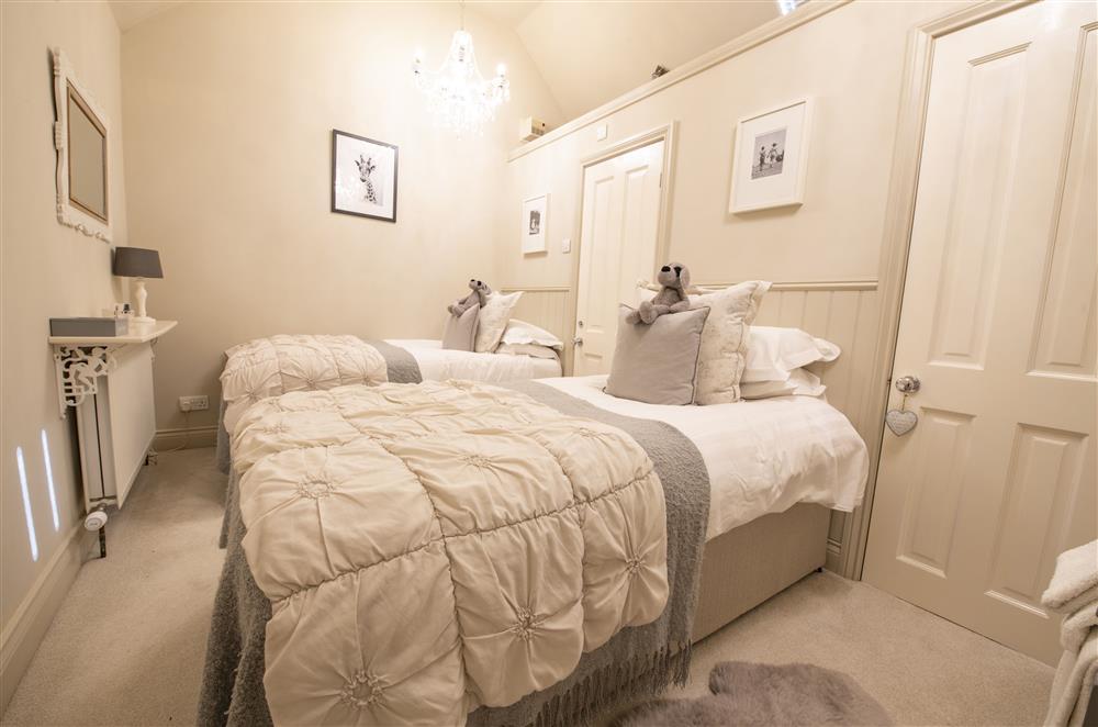 Bedroom five on the second floor, with twin 3’ single beds  at Willowgarth House, Northallerton, North Yorkshire