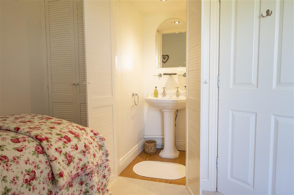 Bedroom four has a vanity basin at Willowgarth House, Northallerton, North Yorkshire