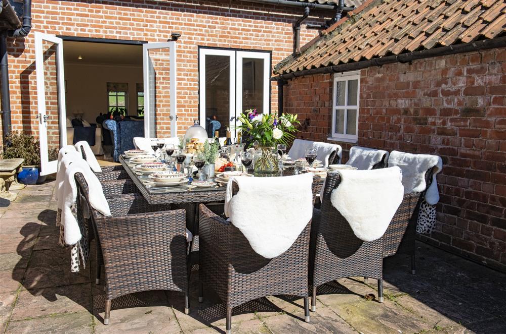 Outside, the spacious courtyard garden is the ideal place for alfresco dining at Willowgarth House, Northallerton, North Yorkshire