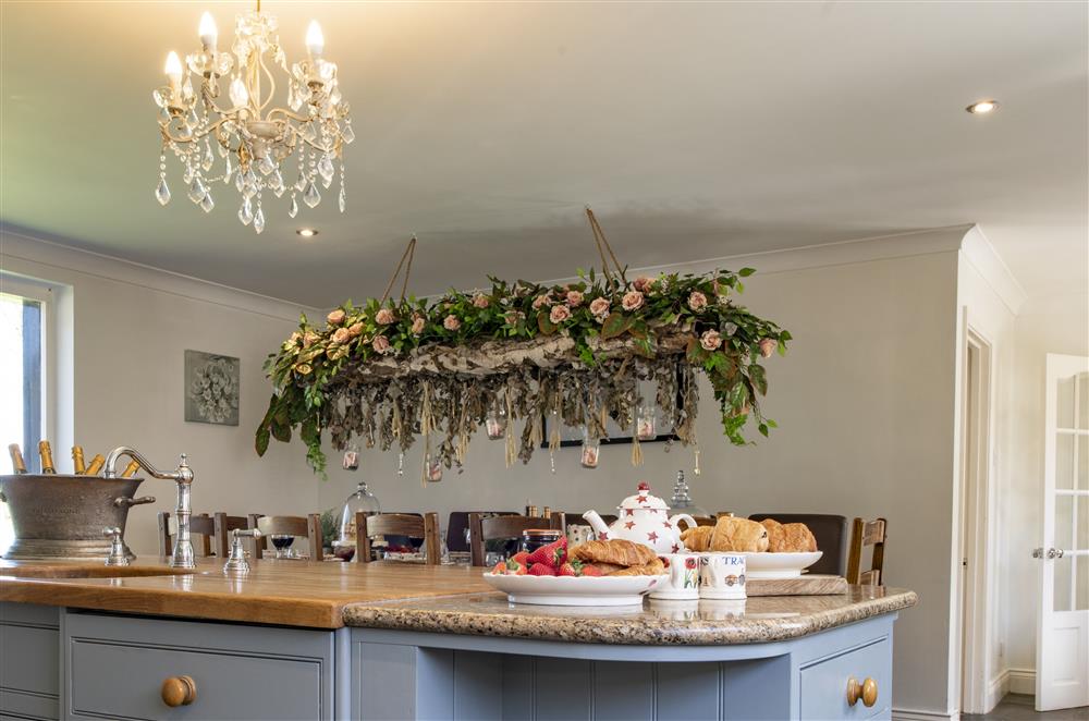 The impressive floral display is the focus of the room  at Willowgarth House, Northallerton, North Yorkshire