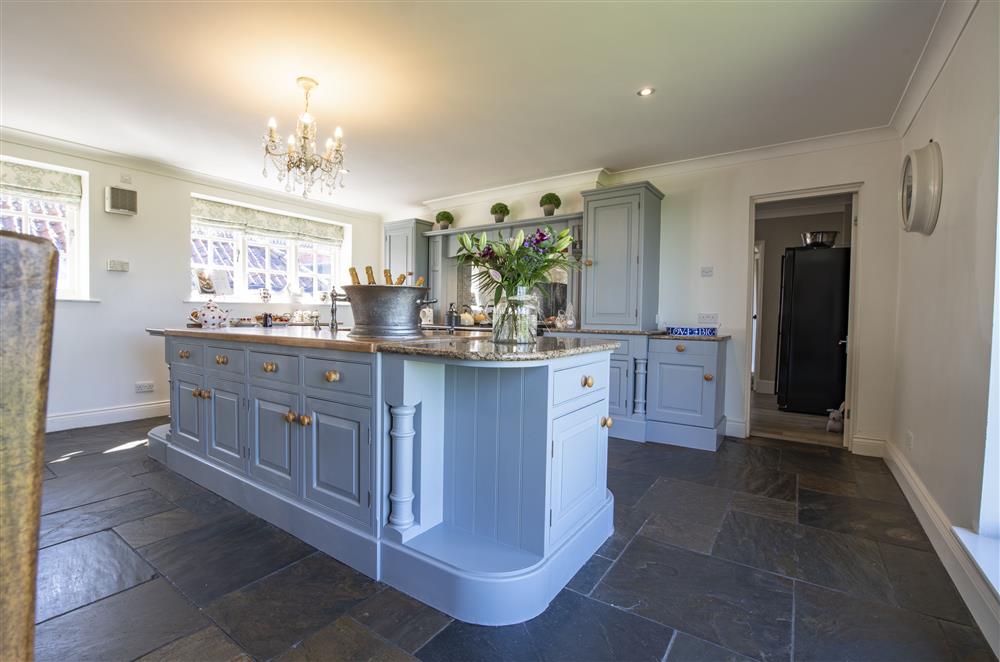 The island in the kitchen provides ample space  at Willowgarth House, Northallerton, North Yorkshire