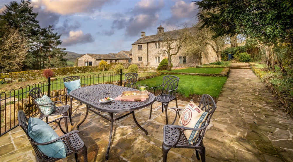 The outdoor seating and garden (photo 2) at Wilson Farmhouse in Hope Valley, Derbyshire