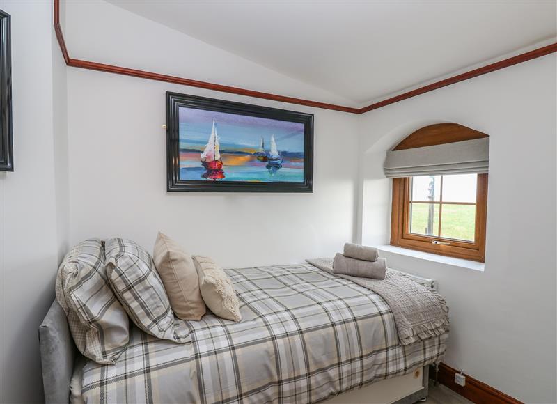 This is a bedroom (photo 2) at Winding Wheel Cottage, Cambois near Ashington