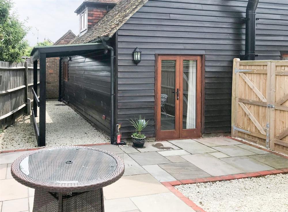 Enclosed patio area at rear of property at Windmill Barn in Windmill Hill, near Hailsham, East Sussex