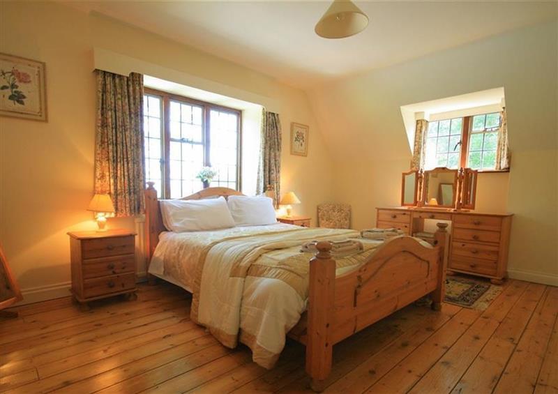 One of the bedrooms at Windy Ridge Cottage, Longborough