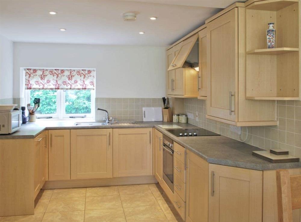 Open plan living/dining room/kitchen (photo 4) at Winhill Cottage in Bamford, South Yorkshire