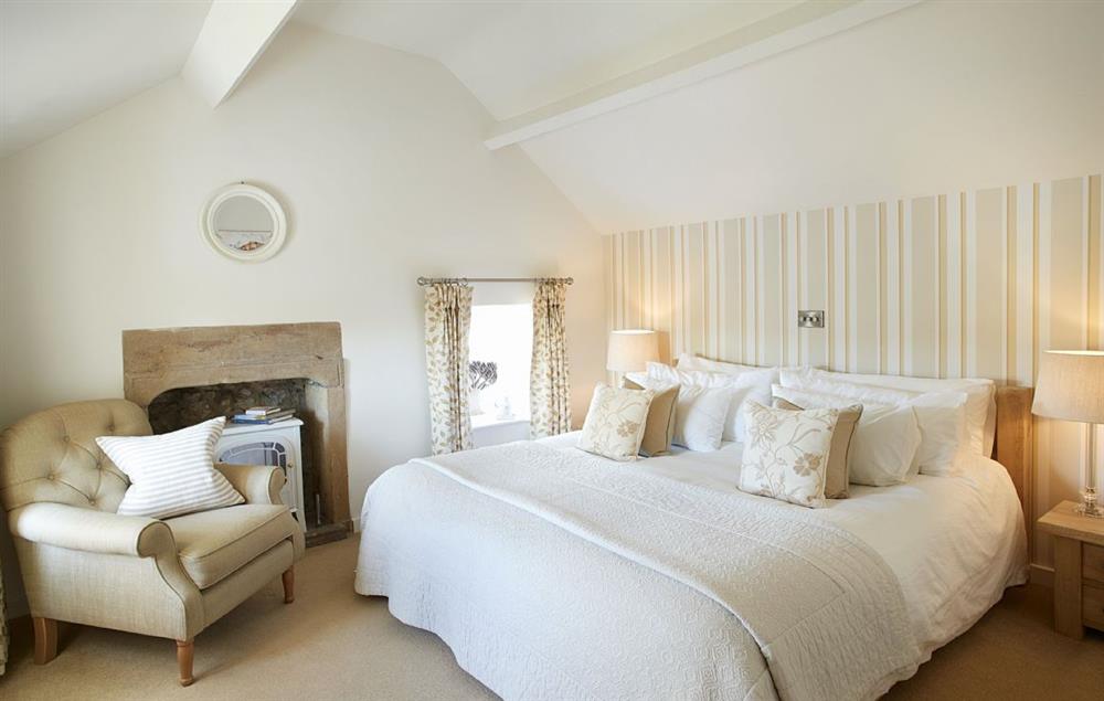 Double bedroom with super king size bed at Winsmore Cottage, Over Haddon