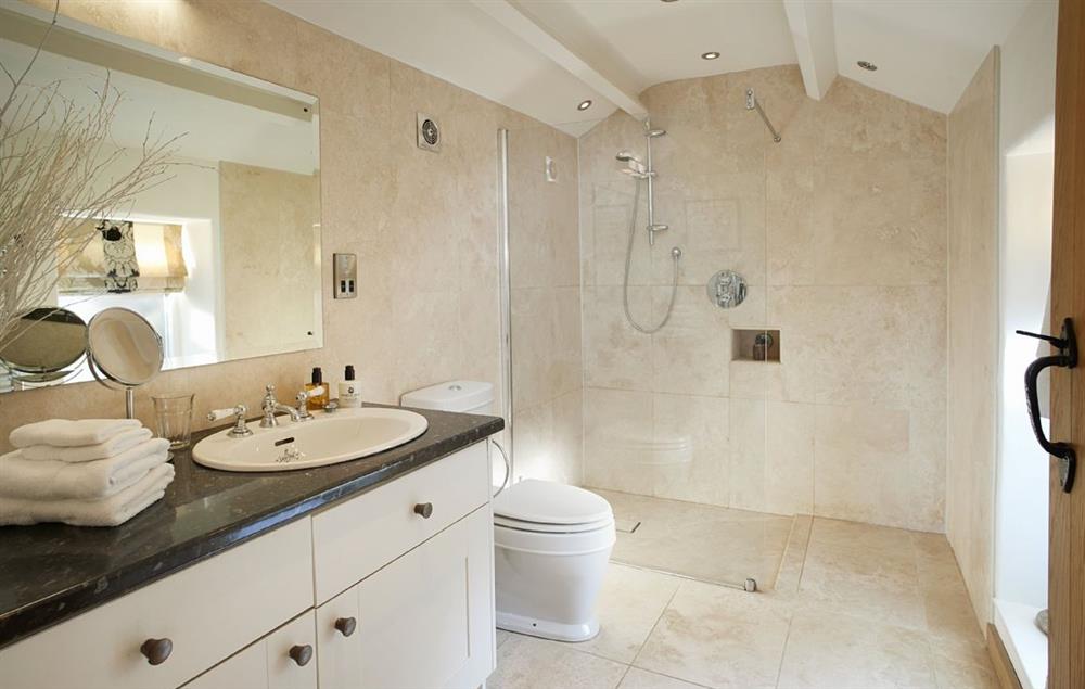 Limestone wet room with walk-in rain shower at Winsmore Cottage, Over Haddon