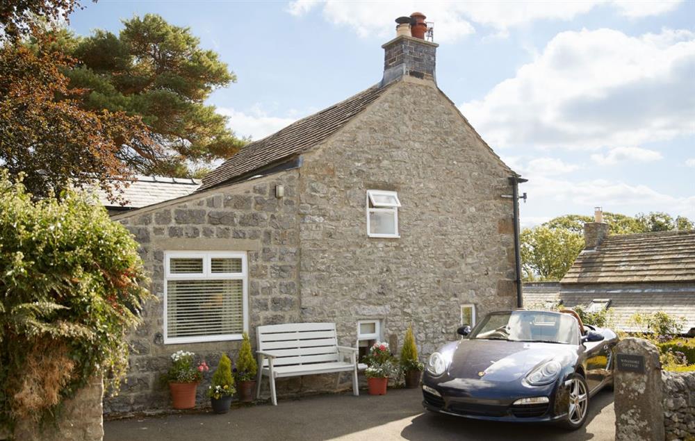 Winsmore Cottage has parking for two cars in the drive