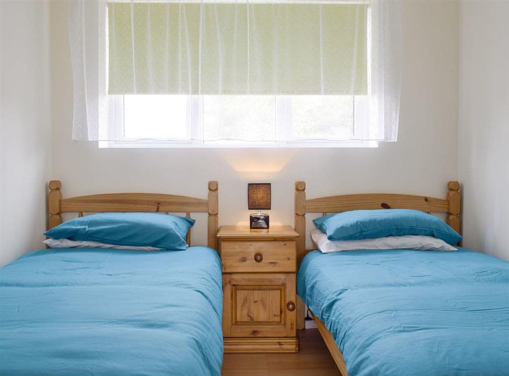 Comfortable twin bedroom at Winston Crescent in North Bersted, near Bognor Regis, West Sussex