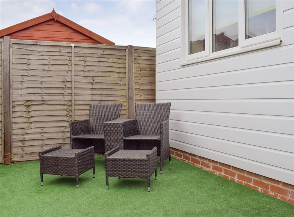 Patio area with outdoor seating at Winston Crescent in North Bersted, near Bognor Regis, West Sussex