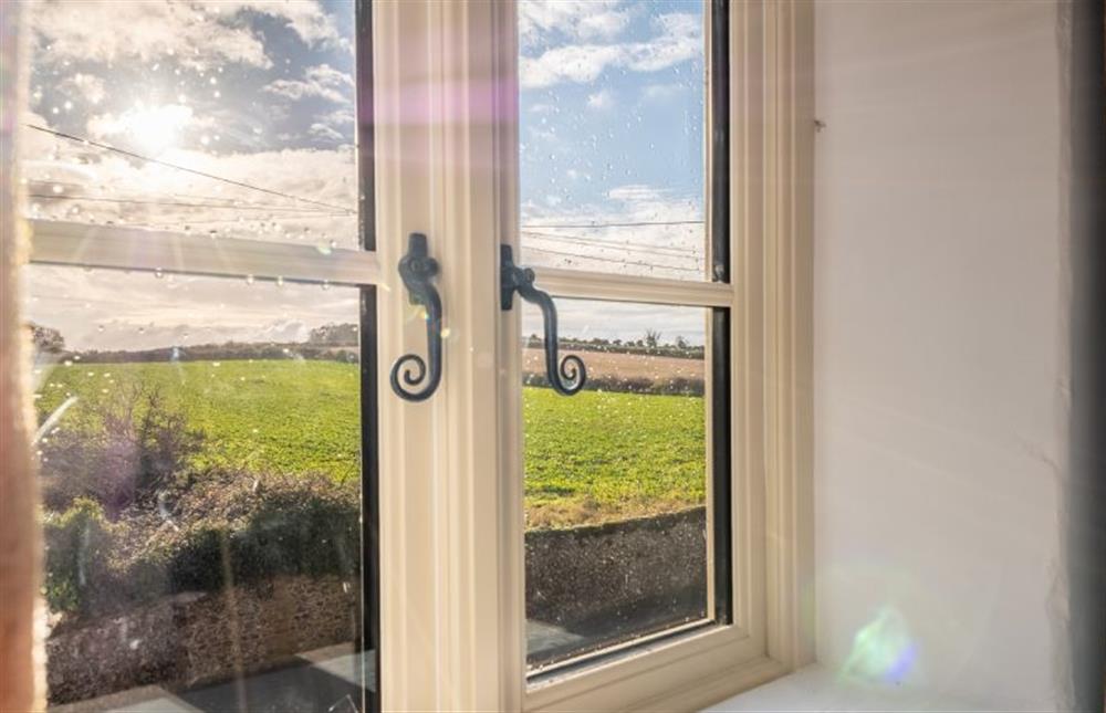 First floor: Field views from the master bedroom at Wishing Well Cottage, North Creake near Fakenham