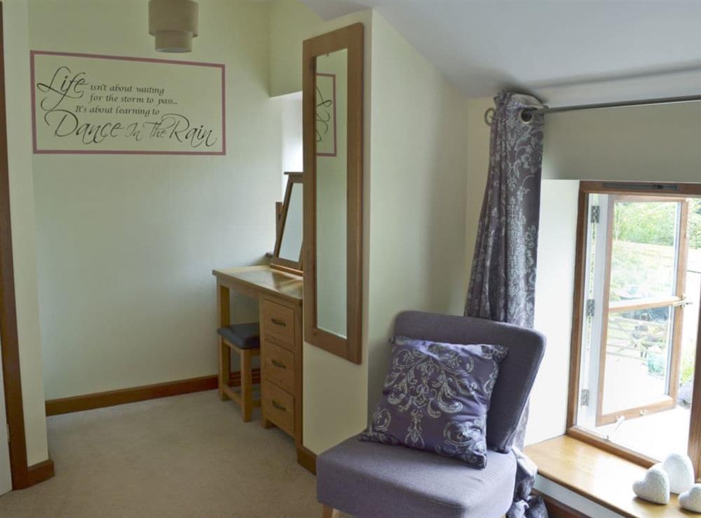 Charming double bedroom (photo 2) at Wisteria Cottage in Bovey Tracey, Devon