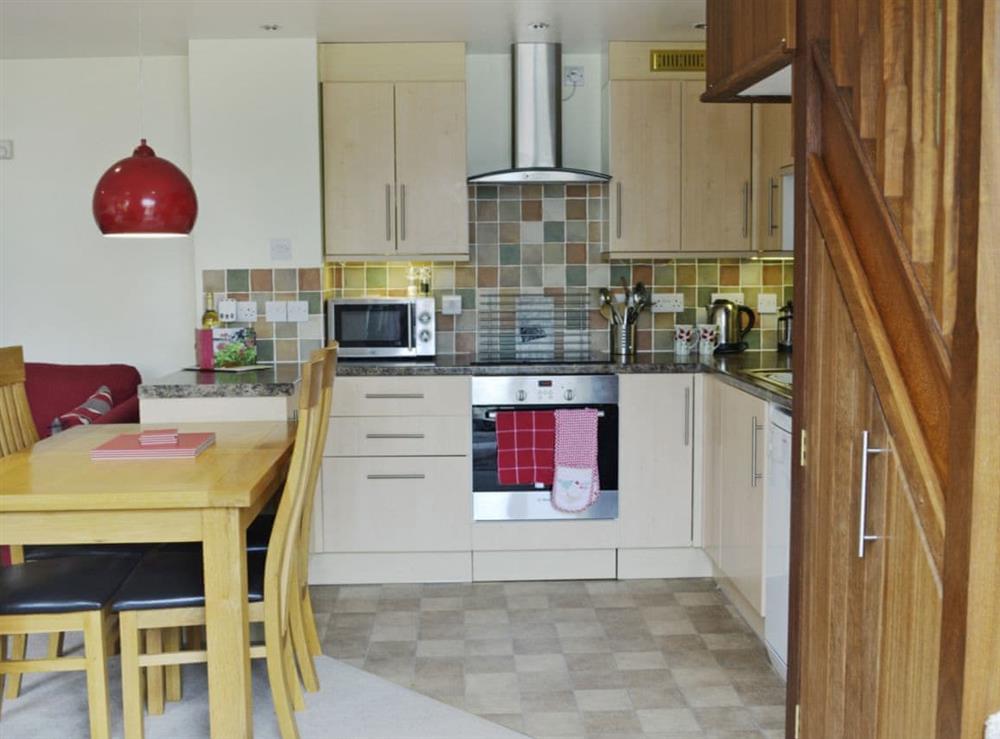 Well equipped kitchen at Wisteria Cottage in Bovey Tracey, Devon