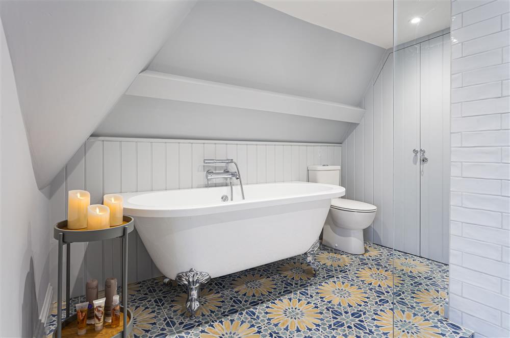 En-suite bathroom with roll-top bath at Wisteria Cottage, Urchfont, near Devizes