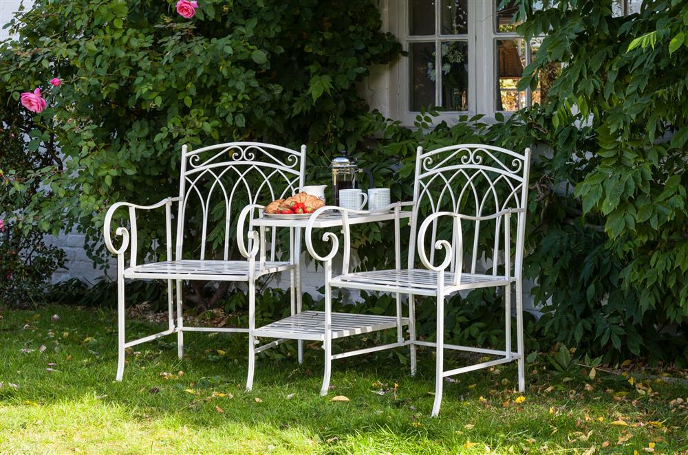 Enjoy a morning coffee in the garden at Wisteria Cottage, Wiltshire at Wisteria Cottage, Urchfont, near Devizes