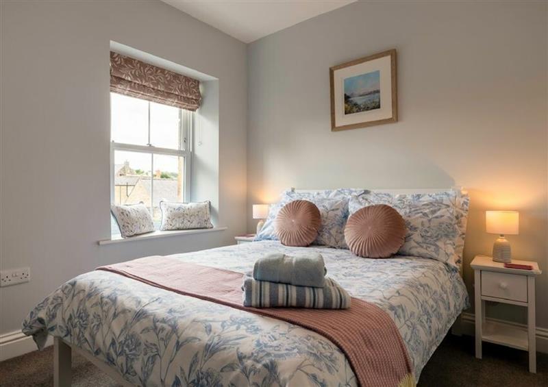 One of the 2 bedrooms at Wisteria Cottage, Warkworth