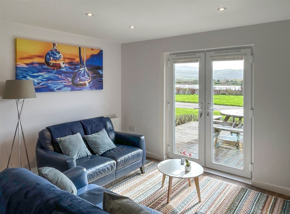 Open plan living space at Wisteria Lodge in Sunset Lakes, Isle Of Man