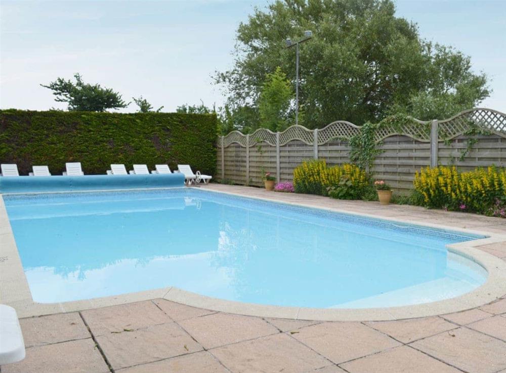 Outdoor heated swimming pool at Poplar, 