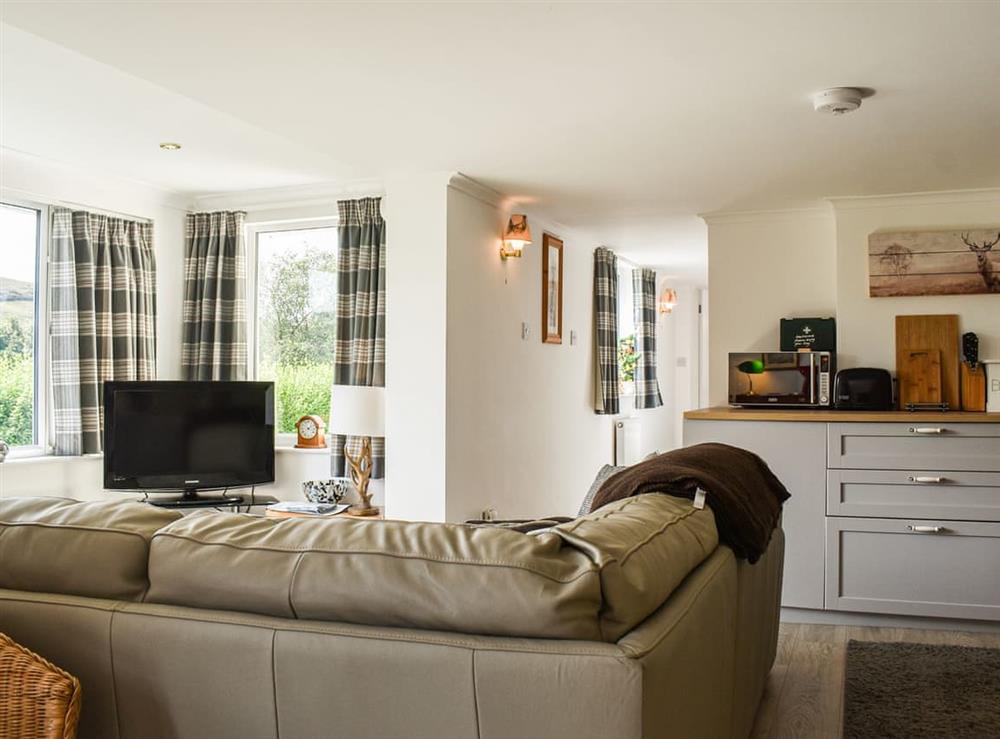 Living area at Withymead Cottage in Withypool, Somerset