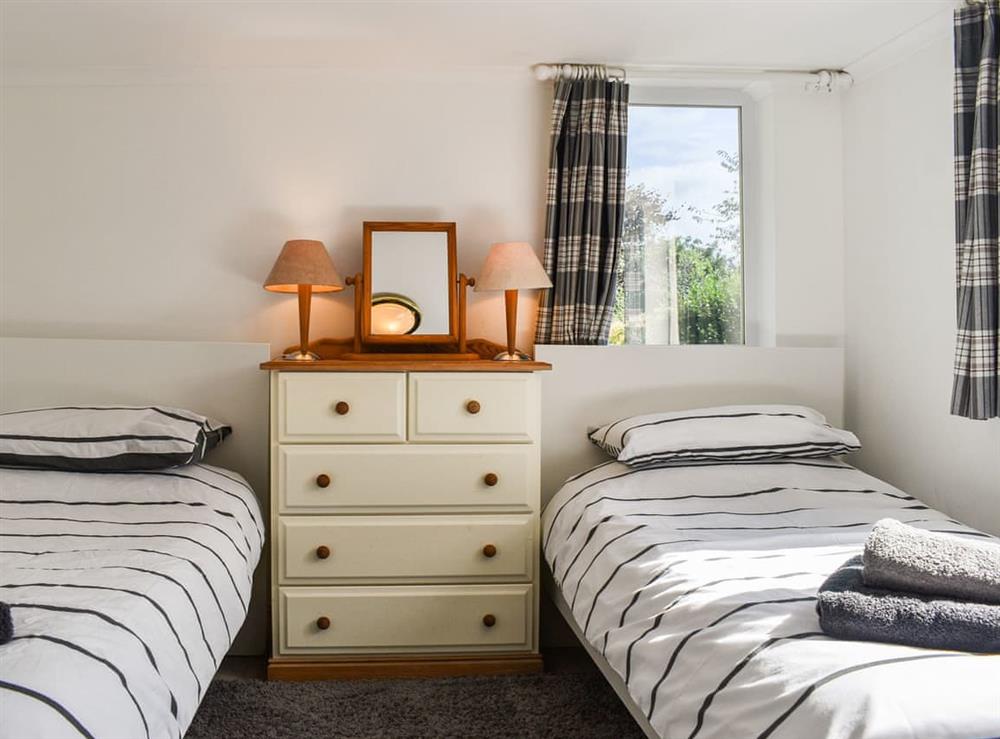 Twin bedroom at Withymead Cottage in Withypool, Somerset