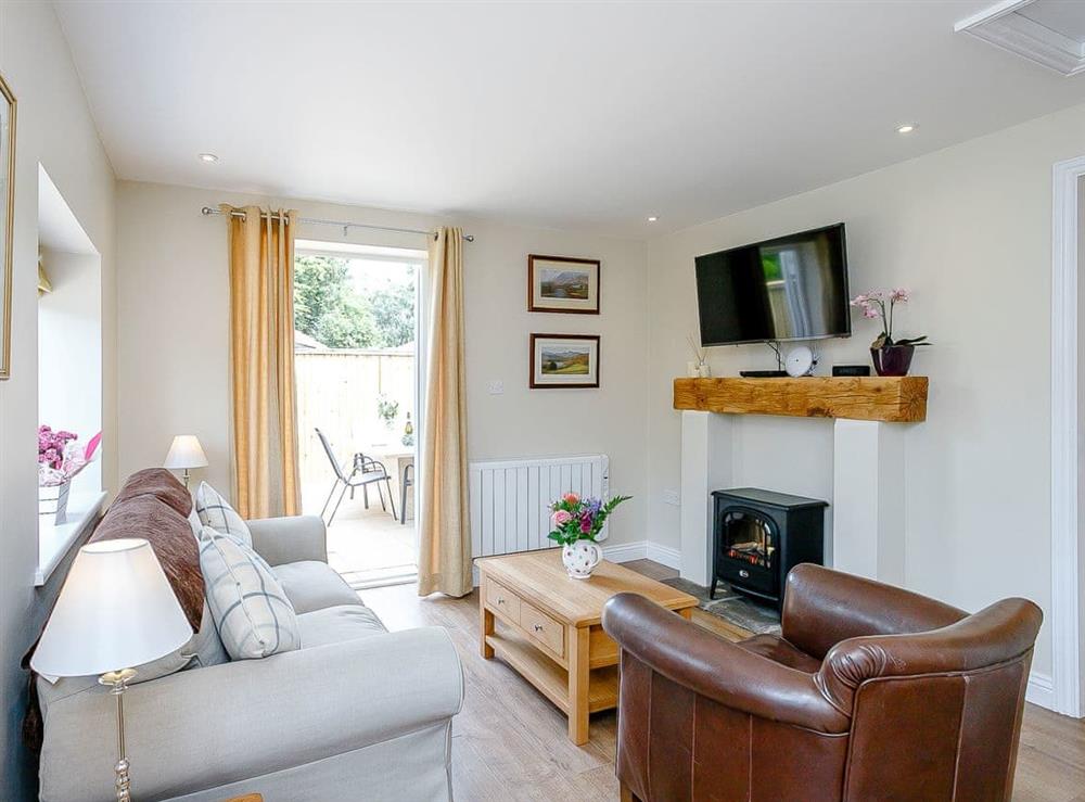 Comfortable lounge area at Wits End Cottage in Roughton, near Woodhall Spa, Lincolnshire