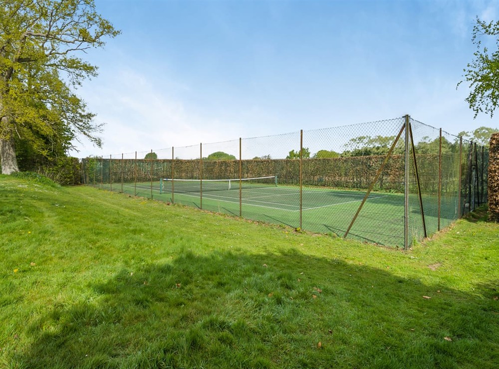 Tennis court at Wittle Cottage in Quidenham, Norfolk