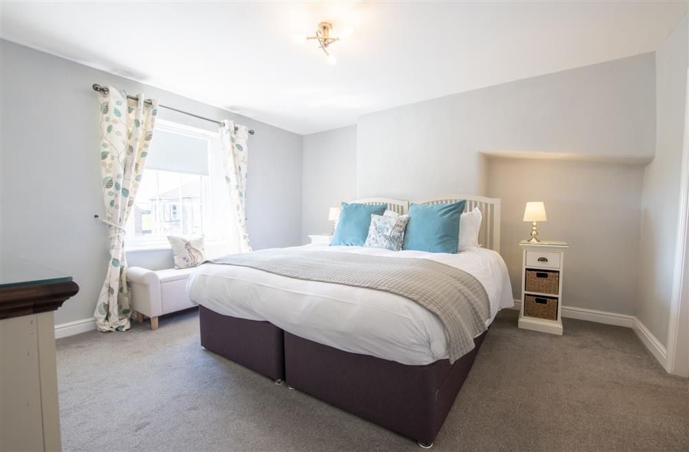 Bedroom one with a 6’ super-king size (zip and link) bed at Witton View, Leyburn