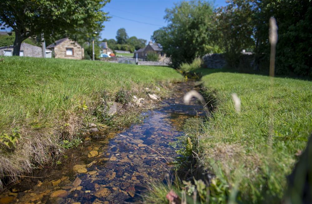 The beck that trickles through the village at Witton View, Leyburn