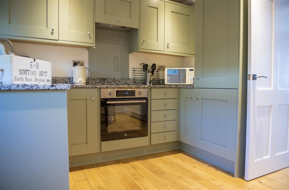 The well-equipped kitchen has beautiful granite worktops at Witton View, Leyburn