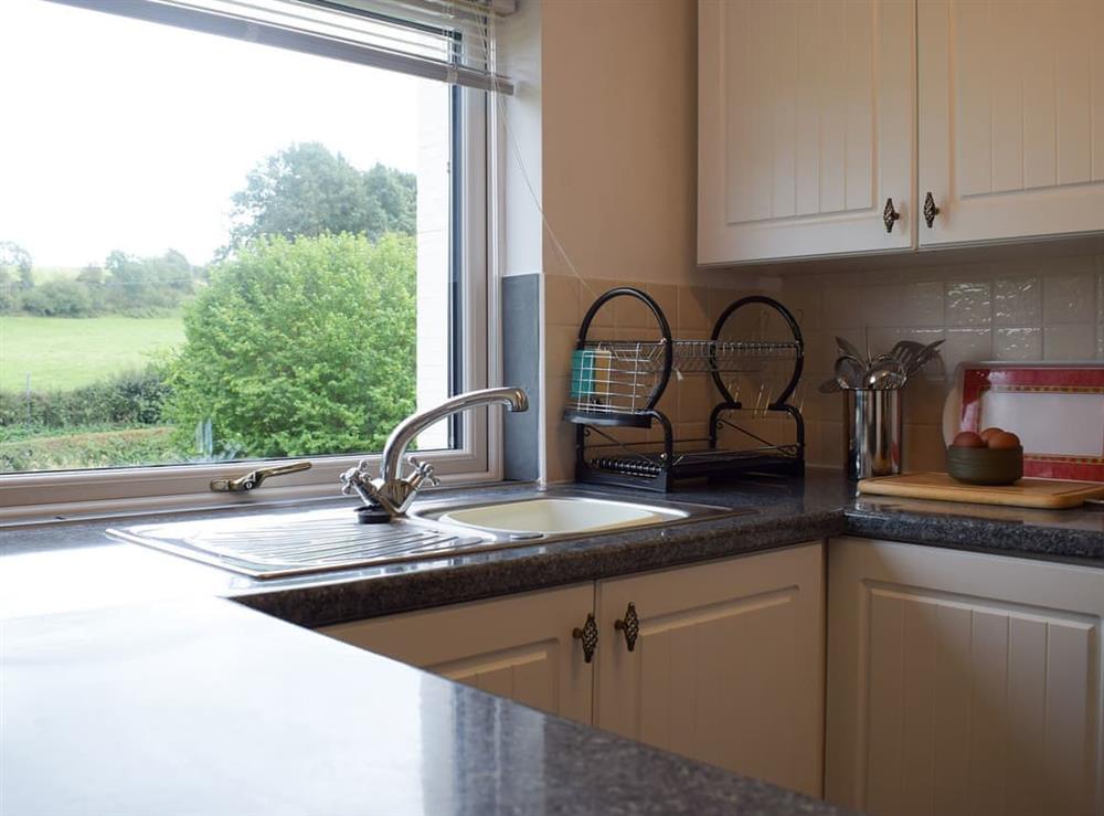 Well-appointed kitchen with great views at Wokkon Lodge in Castle Pulverbatch, near Shrewsbury, Shropshire