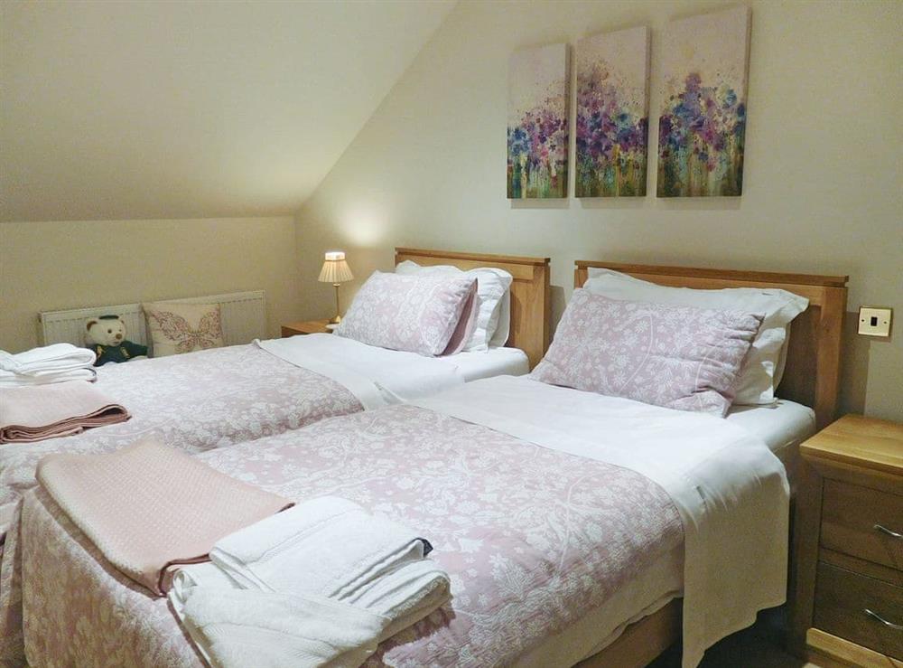 Twin bedroom at Wold View Cottage in Thorpe Bassett, near Malton, Yorkshire, North Yorkshire