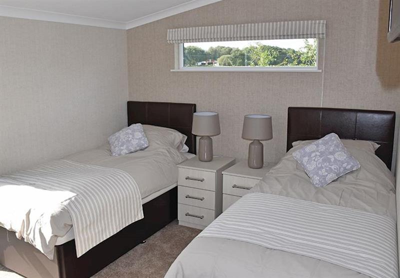 Twin bedroom at the Glen Mhor 2 at Wold View Lodges in Claxby, Nr Market Rasen