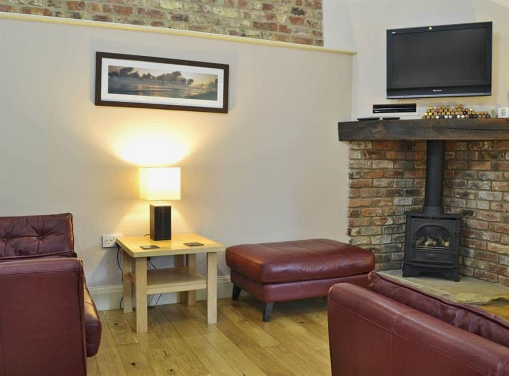 Cosy living room area at Woldsend Holiday Cottages: Rose Cottage in Rillington, North Yorkshire., Great Britain