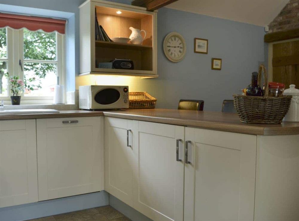 Immaculately presented kitchen area (photo 2) at Woldsend Holiday Cottages: Rose Cottage in Rillington, North Yorkshire., Great Britain