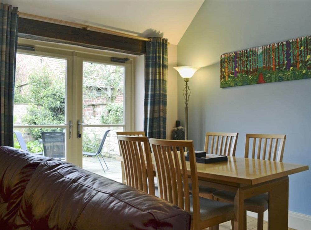Inviting dining area at Woldsend Holiday Cottages: Rose Cottage in Rillington, North Yorkshire., Great Britain