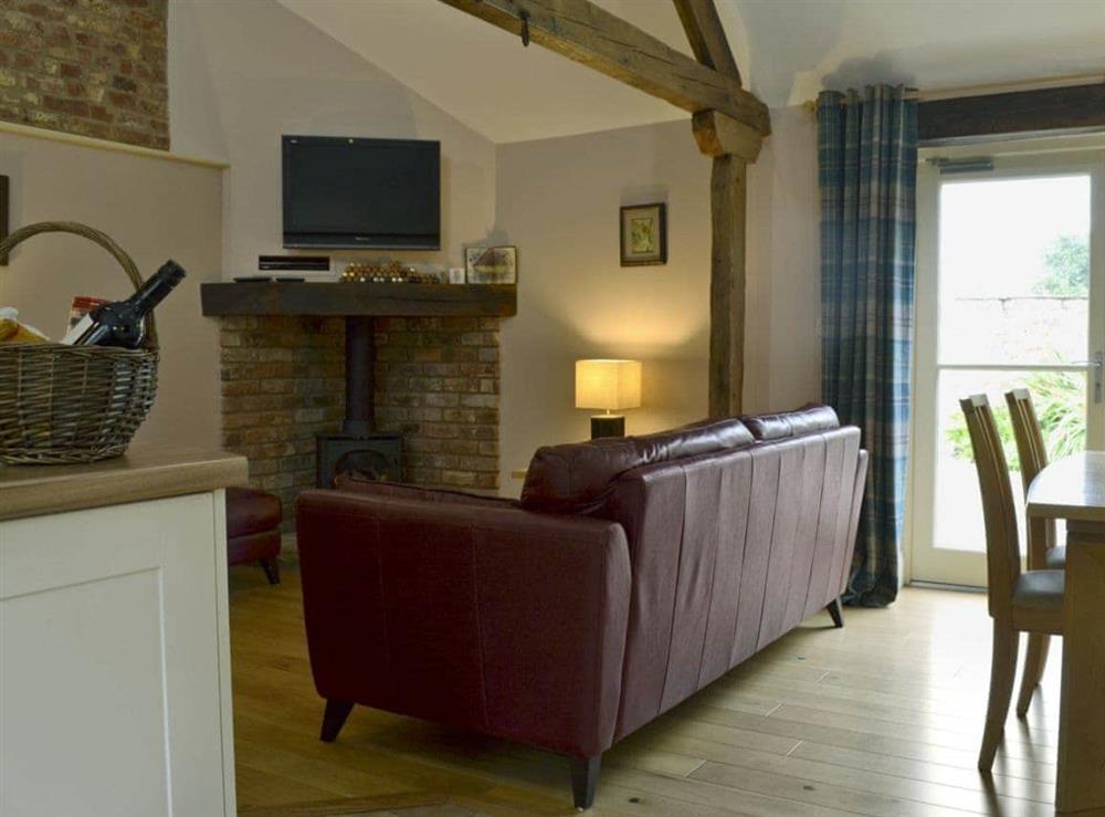 Spacious, beamed open plan living space at Woldsend Holiday Cottages: Rose Cottage in Rillington, North Yorkshire., Great Britain