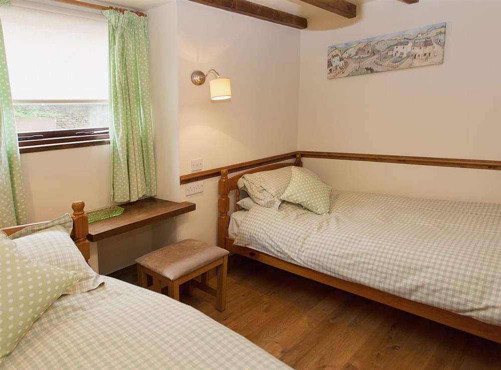 Twin bedroom at Tom Boys Cottage, 